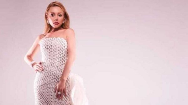 Тина Кароль примерила полупрозрачное платье от ливанского дизайнера